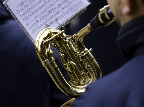 a musician playing a wind instrument in a band