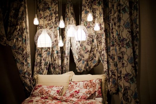 Canopy bed with floral curtains