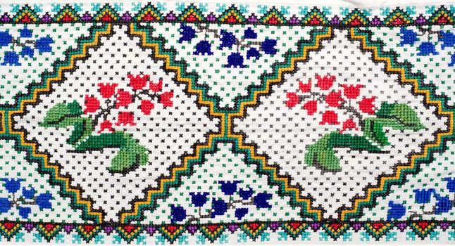 embroidered good by cross-stitch pattern. ukrainian ethnic ornament