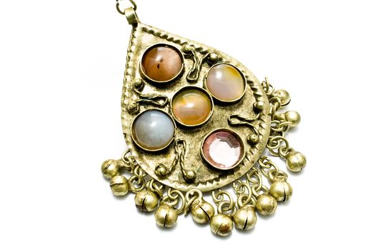Antique necklace pendant with gems isolated on white