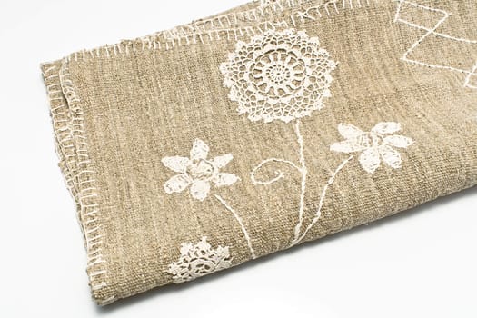 Natural rustic linen with lace on white background