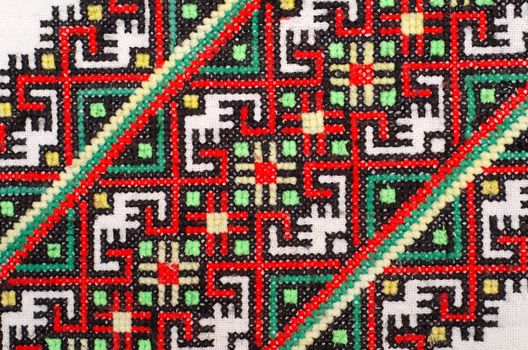 embroidered good by cross-stitch pattern. ukrainian ethnic ornament