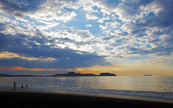 Dramatic skies and flowing water at sunset in Guanacaste