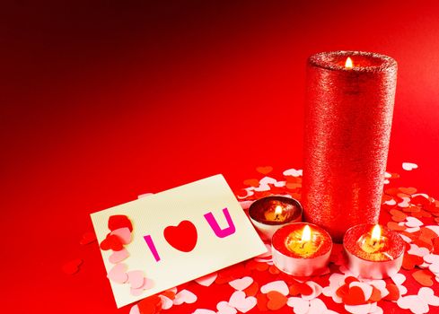 St. Valentine's day greeting background with four burning candles