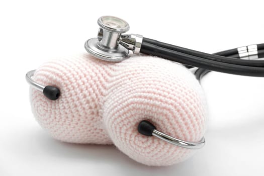 Perspective of Stethoscope and Heart on White Background using as Valentine Love Concept
