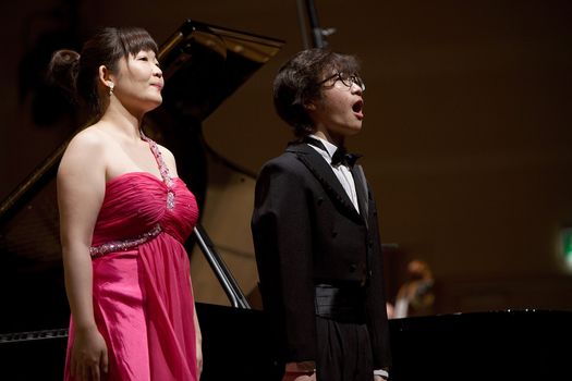 Kim Serungyoun - pianist (Korea) (left). At fourteen years old pianist Na Woochuel (Korea) ( right ). During concert in Gorzow Wielkopolski Philharmonic, Poland 2012.01.25.