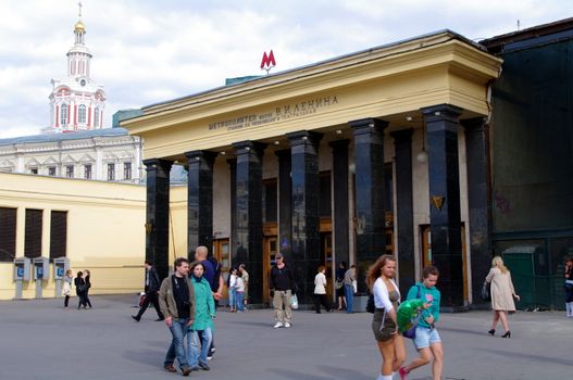 Moscow, Russia - June 14, 2010: Summer day. Peoples walk near the entrance of Teatral'naya metro station on June 14, 2010 in Moscow, Russia