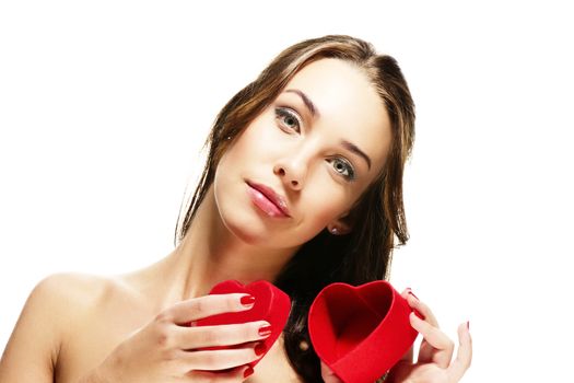 beautiful woman opening heart shaped present box on white background