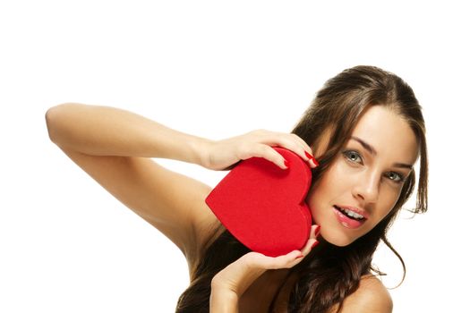 amazing beautiful woman holding red heart on white background