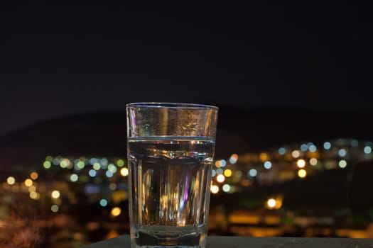 glass in front of defocused lights 