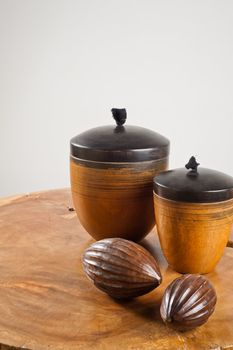 Wooden objects as interior decoration on wooden table