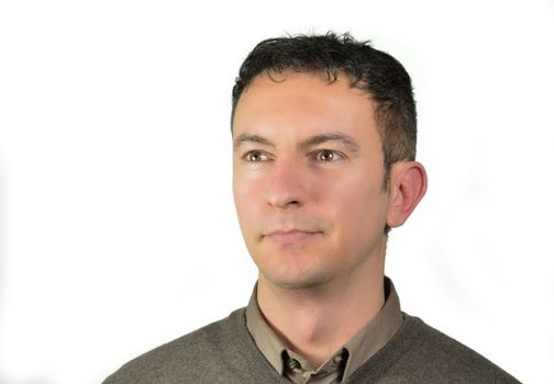 Portrait of handsome young man looking off camera