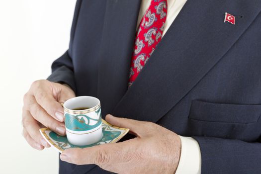 Businessman Holding Turkish Coffee