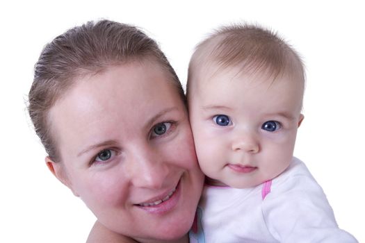 Mother and daughter posing cheek to cheek.