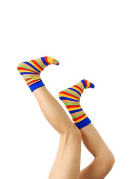 Active woman legs in multi-colored socks