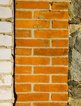 Architectural white red brick and stone wall background.