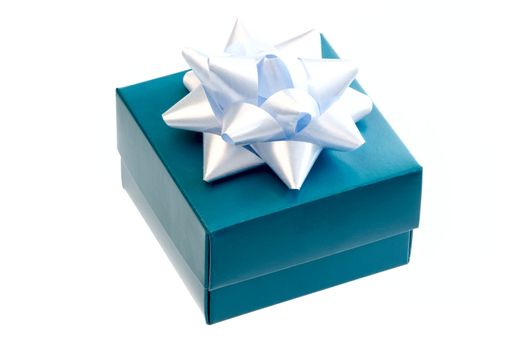 Gift box with a  white ribbon bow isolated on white background.