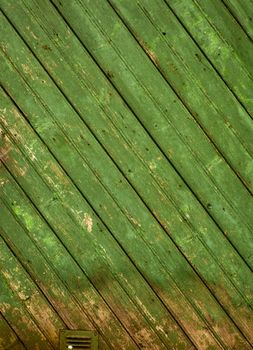 Background picture made of old green wood boards