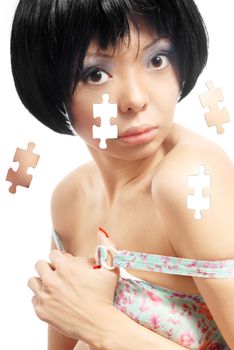 Sensual photo of the model with puzzle effect on her skin