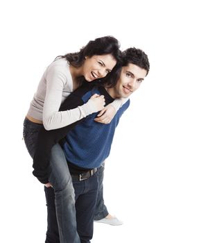 Attractive and happy young couple isolated over a white background