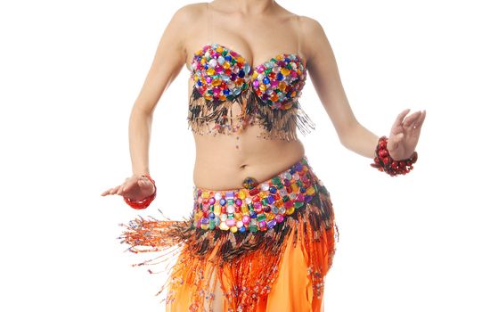 Photo of the active lady in Oriental costume dancing belly-dance
