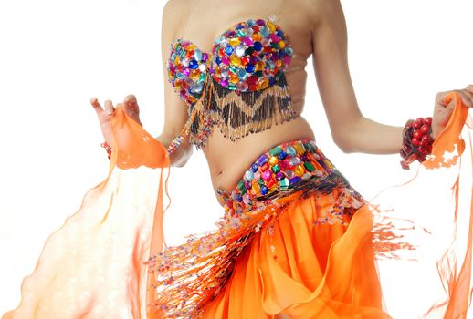 Close-up photo of the dancer in traditional costume on a white background