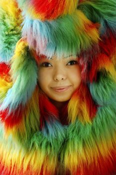 Smiling lady in colorful fur