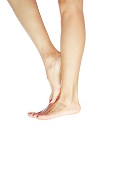 Female shoeless feet on a white background