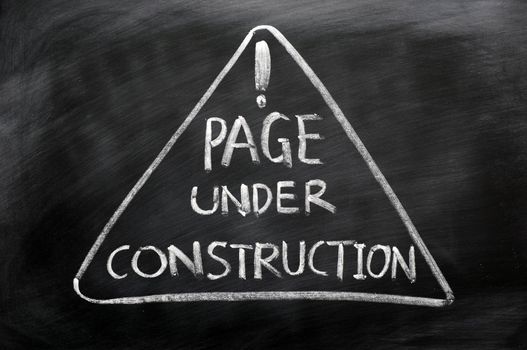 Page under construction concept drawn in chalk on a blackboard
