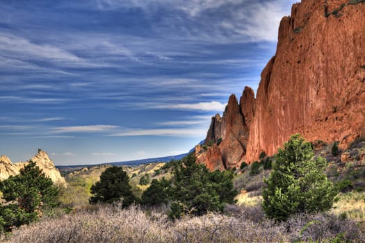 A high dynamic range landscape photo of the red rocks in the Garden of the Gods park in Colorado Springs, Colorado.