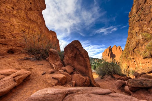 A high dynamic range landscape photo of the red rocks in the Garden of the Gods park in Colorado Springs, Colorado.