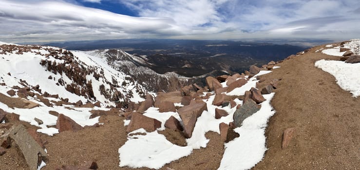 A panoramic shot of the view from the top of Pikes Peak.