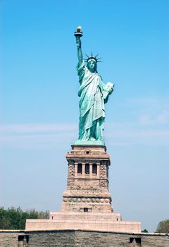 Statue of Liberty fragment over blue sky