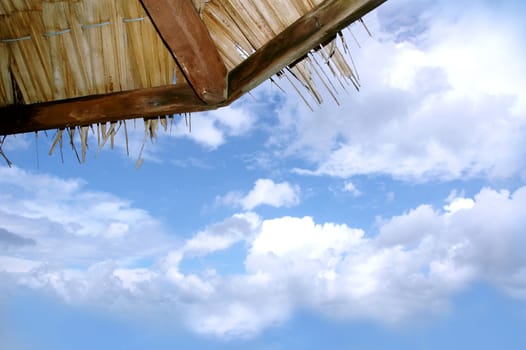 Hut against bright blue sky on a tropical resort