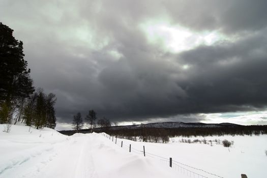 A winter landsacpe with lots of snow.