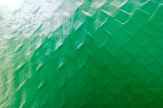 A green grid metal texture background