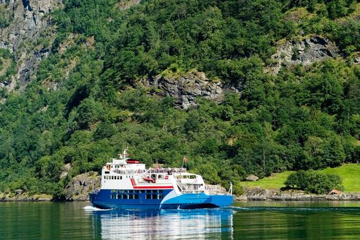 Cruise ship on Sognefjord near Gudvangen in the western area of Norway.