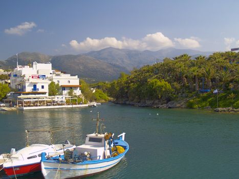 view of the harbour of sissi, crete