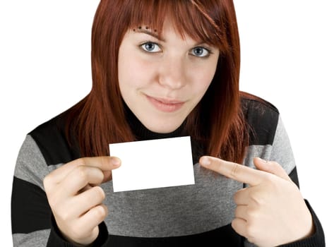 Girl pointing finger at a blank business card, smiling and cute.

Studio shot.