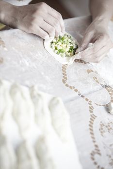 Human hands preparing ties