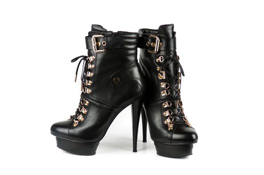 black female boots on a white background