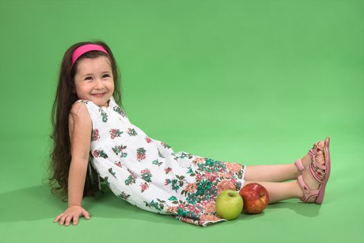 Portrait of the girl with a red apple