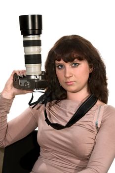 The girl - photographer with the camera on a white background