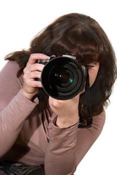The girl - photographer with the camera on a white background