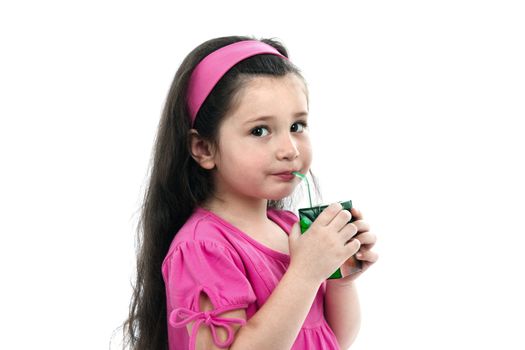 The girl drinks juice is isolated on a white background