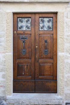 Vintage entrance. Closeup of nice ancient wooden door