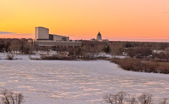 Wascana lake frozen on a cold November day during winter in Regina, Canada.