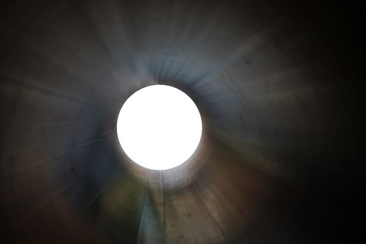 inside a cylinder with a white ending for copy space 
