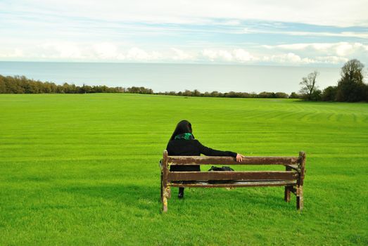 Lonely Woman staring the sea