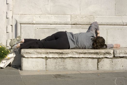 Homeless sleeping on the bench